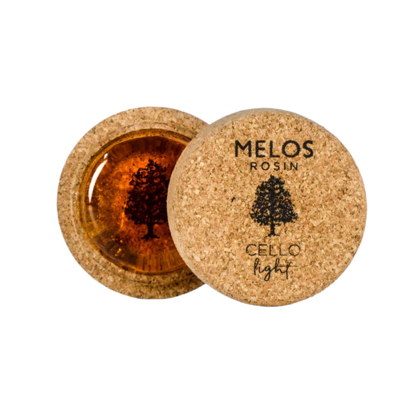 Melos cello rosin light version shown in cork holder
