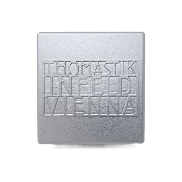 Thomastik-Infeld Cello Rosin showing silver cover with brand name logo TIVC01